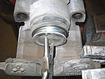 Unthreading Piston